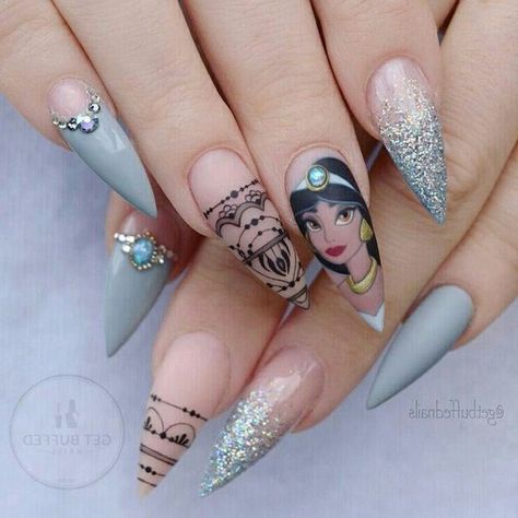 stiletto-nails-simple-nail-designs-jasmine-disney-inspired-manicure-blue-matte-glitter-black-nail-polish-jasmine-drawing Atlantis Nails, Jasmine Nails, Disney Acrylic Nails, Unghie Nail Art, Unicorn Nails, Nail Art Disney, Disney Nails, Nails Polish, Princess Jasmine