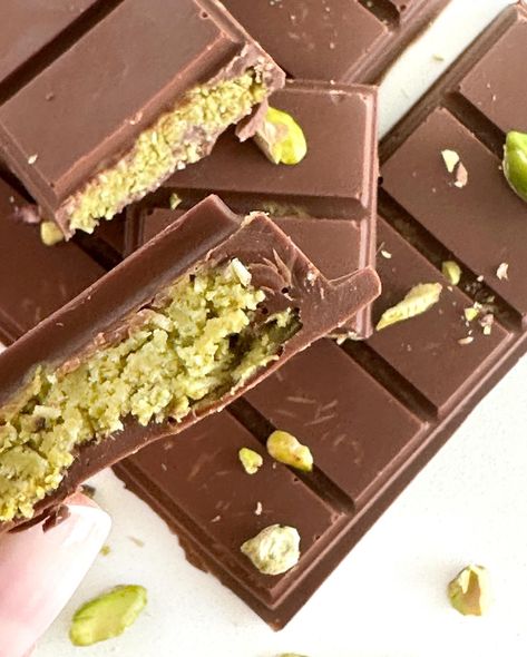 𝗗𝗨𝗕𝗔𝗜 𝗖𝗛𝗢𝗖𝗢𝗟𝗔𝗧𝗘 ‌ I just love this viral Dubai chocolate bar! Being a bit of a chocoholic, I can’t get enough of the unique flavors in this pistachio-filled bar. You are going to love making this treat, and it’s really easy. ‌ What is Dubai chocolate made of? ‌ Made famous on TikTok, the Dubai chocolate bar consists of milk chocolate surrounding knafeh, also called kunafa. This creamy pistachio filling, which tastes hazelnutty, is made with shreds of kataifi that add a crunchy texture. ‌ Don’... Chocolate Bar Molds, Pistachio Butter, Best Shakes, Asian Desserts, Food Trends, How To Make Chocolate, Chocolate Bar, Pretty Food, Pistachio