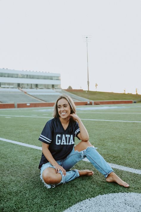 Senior Picture Ideas Stadium, Football Stadium Senior Pictures, Georgia Southern Graduation Pictures, Stadium Senior Pictures, College Shirt Senior Pictures, Stadium Photoshoot, Greek Photoshoot, Stadium Pics, Senior Graduation Pictures