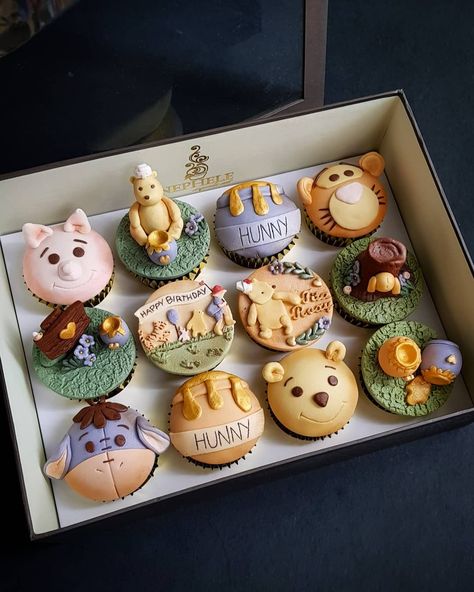 Nephele Cupcake Art on Instagram: “Always excited to make Winnie the Pooh themed cupcakes since it's my son's all time fave. Decided to make the classic Pooh this time 😁…” Classic Pooh Cupcakes, Winnie The Pooh Themed Cupcakes, Vintage Winnie The Pooh Cupcakes, Classic Winnie The Pooh Cupcakes, Winnie Pooh Cupcakes, Pooh Bear Cupcakes, Winnie The Pooh Baby Shower Cupcakes, Cupcakes Winnie Pooh, Winnie The Pooh Cupcakes Ideas