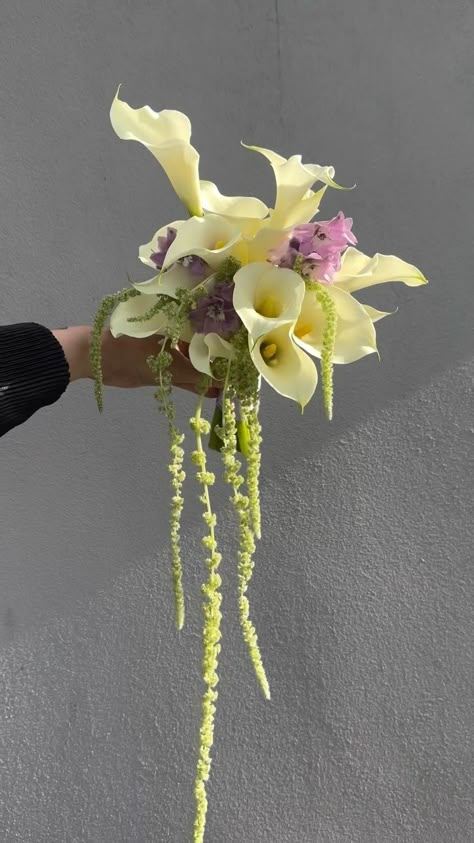 Bridal Bouquet In Vase, Pearls In Bouquet, Light Wedding Bouquet, Ribbon On Wedding Bouquet, Lily Pad Bouquet, Flowy Wedding Bouquets, Burgundy Calla Lily Bouquet, Sculptural Wedding Bouquet, Yellow Orchid Bouquet