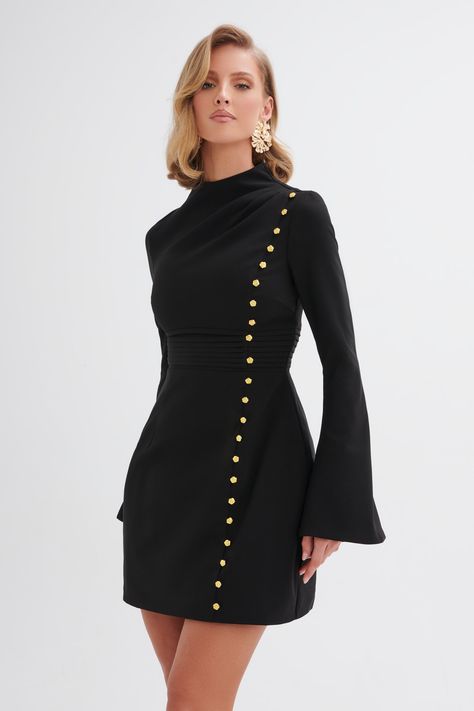 Step into sophistication with our High Neck Rose Button Long Sleeve Mini Dress in Black. Crafted from premium black crepe, this dress features a stylish high neck and a flattering pleated waistband that cinches to perfection. The A-line mini skirt and long flared sleeves with split details create a striking silhouette, while the gold rose button accents add a touch of opulence. Perfect for special occasions and luxurious date nights, this timeless and versatile dress pairs beautifully with strap Luxury Mini Dress, Flared Long Sleeve Dress, Lavish Alice Dress, Winter Graduation, Earrings Fabric, Alice Dress, Dream Cast, Lavish Alice, Bridal Jacket