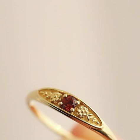 TED&MAG Jewelry on Instagram: "New Arrivals — January birth ring♥️ This ring will be a very meaningful piece for those born in January.  January’s birthstone and birth flower are garnet and carnation.  Brilliant red garnet and delicately carved carnations will shine and bloom forever.  This dainty and slim signet ring is comfortable to wear all the time.  This piece will be perfect gift for both to others and yourself.   Rings for other months will also be released✨ Look forward to it!           #birthstone #birthflower #garnetring #january #ring #goldring #signetring #jewelry #meaningfulgifts #flower #carnation #garnet #stackingrings #tedandmag" Hippie Wedding Ring, Birth Ring, Flower Carnation, Born In January, New Gold Jewellery Designs, Hippie Wedding, Outfit Check, Garnet Jewelry, Birth Flower