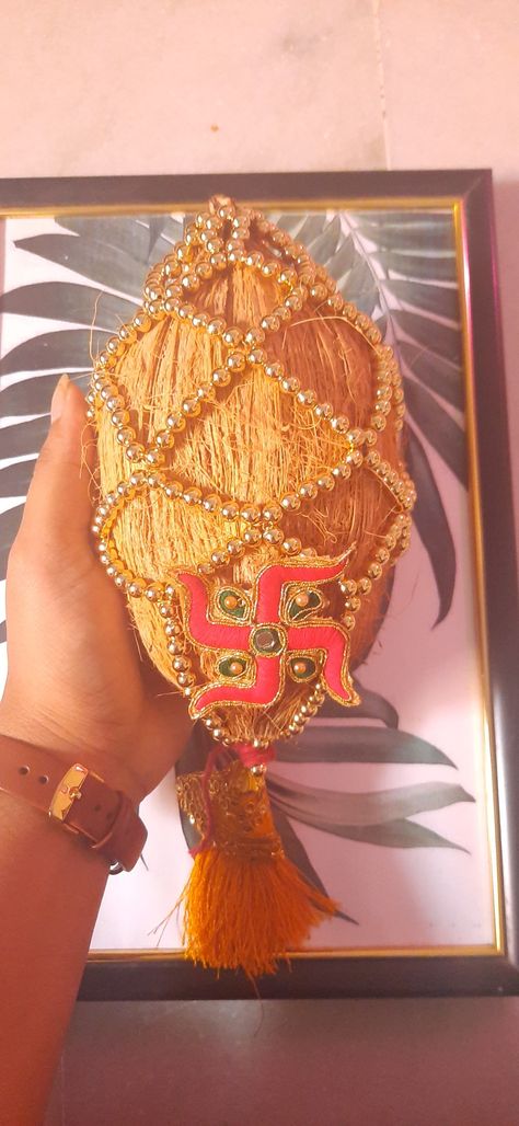 Shagun Nariyal Decoration for engagement ceremony. Shagun Nariyal Decoration, Nariyal Decoration, God Bharai, Decoration For Engagement, Coconut Decoration, Rings Ceremony, Engagement Ceremony, Wedding Gold, Gold Wedding Jewelry