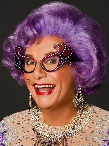 Dame Edna is a character created and played by Australian dadaist performer and comedian, Barry Humphries, famous for her lilac-coloured or "wisteria hue" hair and cat eye glasses or "face furniture," ... Hockney Portraits, Hockney Paintings, David Hockney Portraits, David Hockney Paintings, Barry Humphries, Dame Edna, Australian Icons, Maggie Smith, David Hockney