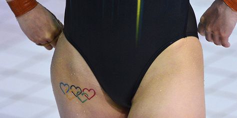 A view shows an Olympic-themed tattoo on Australia's Melissa Wu, as she competes in the women's 10m platform diving competition at the Aquatics Centre during the London Games. (Photo by Toby Melville/Reuters) Olympic Tattoo, Running Tattoo, London 2012 Olympics, Olympic Theme, Tatoo Inspiration, Olympic Rings, 2012 Olympics, Ring Tattoos, Olympic Athletes