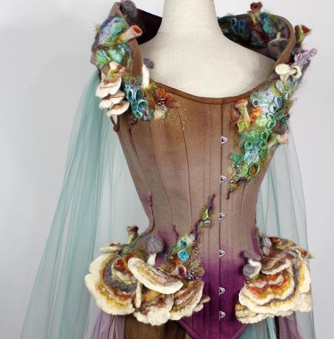 What would an outfit inspired by the work of architect Antoni Gaudi look like? The rich, otherworldly colours and organic textures of the… Fairy Outfit Ideas, Mushroom Costume, Ren Faire Outfits, Dr Facilier, Ren Faire Costume, Fairy Cosplay, Fairy Outfit, Fair Outfits, Fest Outfits