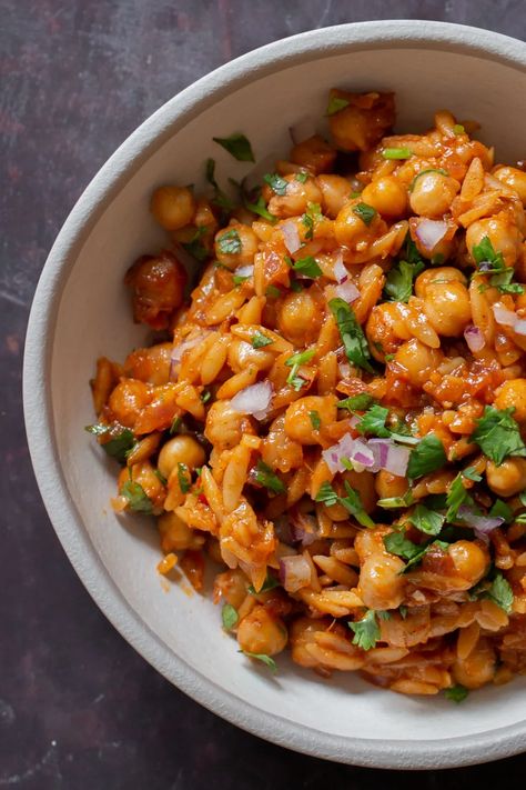 Cajun orzo chickpeas are a satisfying weeknight meal that’s packed with flavor! Tender orzo and goes so well with hearty chickpeas and lots of deep, Cajun spices. Cajun Orzo, Cajun Spices, Orzo Recipes, Plant Kitchen, Chickpea Recipes, Meatless Meals, Orzo, Vegan Dinners, Vegetarian Dishes