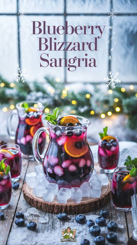 "Indulge in the ultimate winter refreshment with our Blueberry Blizzard Sangria Cocktail Recipe! This frosty blueberry sangria combines the vibrant flavors of blueberries and citrus for a delightful twist on traditional sangria. Perfect for holiday gatherings, this Blueberry Sangria Winter Drink is a must-try! Explore our Blizzard-Inspired Sangria Cocktail featuring blueberry white wine sangria with a sparkling finish!" Blueberry Mimosa Recipe, Blueberry Drinks Alcohol, Blueberry Wine Recipe, Blueberry Sangria Recipes, Blue Mixed Drinks, Blueberry Mimosa, Blue Cocktail Recipes, Blue Mocktail, Jack Frost Cocktail