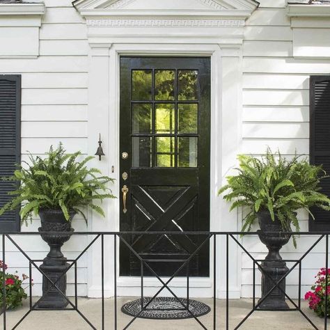 We’re seeing more and more homeowners going for a black front door! It’s true what they sa Iron Railings Outdoor, Porch Railing Designs, Front Porch Railings, Black Front Doors, Railings Outdoor, Flagstone Patio, Porch Railing, Garden Makeover, Iron Railing