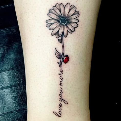 Daisy with ladybug and loving words stem Bumble Bee And Ladybug Tattoo, Ladybug And Daisy Tattoo, Daisy Tattoo With Words As Stem, Sunflower With Ladybug Tattoo, Daisy And Ladybug Tattoo, Sunflower And Ladybug Tattoo, Ladybug On Flower Tattoo, Bug Tattoo Ideas, Ladybug Tattoo Ideas