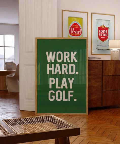 Embrace the love for golf with our vintage style golf art print, Work Hard. Play Golf. home decor art print poster! A perfect gift for golf enthusiasts and retirement gifts for golfers. The distinctive golf term design effortlessly elevates your office walls, making it the perfect choice for stylish office decor. Whether framed on a shelf or wall, this print is a fantastic addition for showcasing your passion for the game of golf. An ideal gift for golfers, its vibrant green color adds a playful touch to home bars or dorm walls.  This print sums up why we play golf.  Work hard all day! Play some golf in your free time!  Print comes UNFRAMED 𝐃𝐄𝐓𝐀𝐈𝐋𝐒: * Paper thickness: 10.3 mil * Paper weight: 189 g/m² * Opacity: 94% * ISO brightness: 104% The photography print may crop slightly diff Golf Home Decor, Father's Day Art, Office Decor Work, Golf Simulator Room, Golf Room, Fathers Day Art, Golf Poster, Golf Decor, Work Office Decor