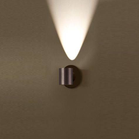 The Arc Wall Sconce adds a simple industrial look to your interior space. The short cylindrical body casts light upward, creating a warm glow of light in your room. Note: Dimmable with Low Voltage Electronic or Triac (Standard) dimers, not included. Wall Uplighters, Up Down Wall Light, Body Cast, Washing Walls, Dark Grey Color, Brushed Aluminum, Brass Color, Light Decorations, Interior Spaces