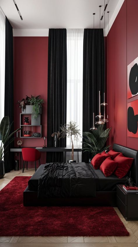 Embrace modern elegance in this striking bedroom! Featuring a luxurious bed dressed in black linens and red accents, high ceilings with pendant lights, and heavy black curtains, this space exudes sophistication. A chic desk and plush red rug add style, while abstract artwork ties the bold color palette together! #redroom #redandblackbedroom #darkromanticbedroom Dark Cozy Room Ideas, Red Black Room Aesthetic, Dark Red Aesthetic Room, Red And Black Bedroom Aesthetic, Red Black And White Room, Dark Red Bedroom Aesthetic, Red And Black Room Aesthetic, Black And Red Room, Gray Red Bedroom