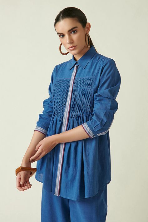 Shop for these amazing collections of Blue Cotton Handloom Embroidery Thread Collared Camilus Smocked Tunic For Women by Payal Pratap online at Aza Fashions. Rice Stitch, Payal Pratap, Smocked Shirt, Modest Dresses Fashion, Tunics Online, Kurti Designs Latest, Handloom Fabric, Dress Design Patterns, Collared Top