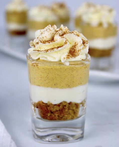 Keto Pumpkin Pie Cheesecake Cups Light, creamy and so decadent, these Keto Pumpkin Cheesecake Cups have mini layers of deliciousness that will make your dessert table a hit! #ketopumpkinpie #ketocheesecakecups #ketopumpkin Keto Pumpkin Pie Cheesecake, Pumpkin Cheesecake Cups, Pumpkin Pie Cups, Gluten Free Cheesecake Recipes, Cheesecake Cups Recipe, Keto Pumpkin Cheesecake, Gluten Free Party Food, Pie Cups, Pumpkin Cream Pie