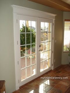 Door and Window Toppers | doovcv toppers on French doors adds visual appeal | Bayer Built Woodworks Cottage Patio, Brick Flooring, Door Trim, Patio Door, Door Trims, Window Trim, Updating House, French Door, Remodel Bedroom