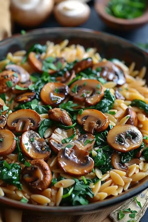 Spinach Mushroom Orzo: A Dish to Delight! - MmmRecipes : Easy and Delicious Recipes Mushroom Orzo Pasta, Mushroom And Orzo Recipes, Creamy Mushroom Spinach Orzo, Spinach Mushroom Quinoa, Mushrooms Spinach Recipes, Spinach Mushroom Orzo, Orzo Side Dishes, Orzo Side Dish Recipes, Mushroom And Spinach Recipes