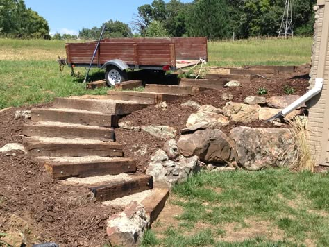 Railroad tie timber steps filled with pea gravel. (Outdoor, exterior, landscaping, stairs) Railroad Tie Steps, Hillside Stairs, Hill Steps, Railroad Ties Landscaping, Sleeper Steps, Yard Steps, Backyard Stairs, Landscape Stairs, Landscape Steps