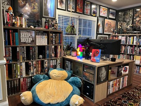 Gaming Storage Ideas, Gaming Bookshelf, Maximalist Game Room, Vintage Gamer Room, Game Display Ideas, Dark Academia Game Room, Dark Academia Gamer Room, Nerd Bedroom Aesthetic, Nerdy Bedroom Aesthetic