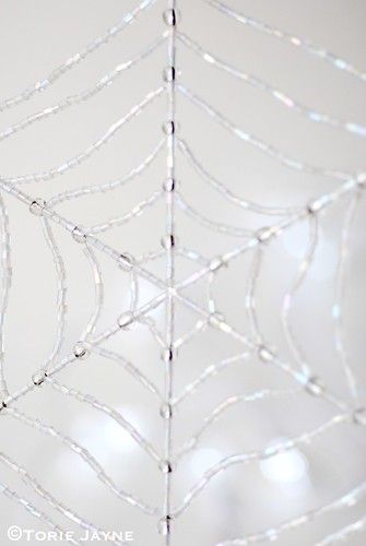 Beaded spiderweb up close | Blogged at Torie Jayne.com Blog|… | Flickr Spiderweb Tutorial, Beaded Spiderweb, Room Halloween Decor, Bead Spider, Christmas Spiders, Barbed Wire Art, Wire Spider, Glam Halloween, Spider Web Decoration