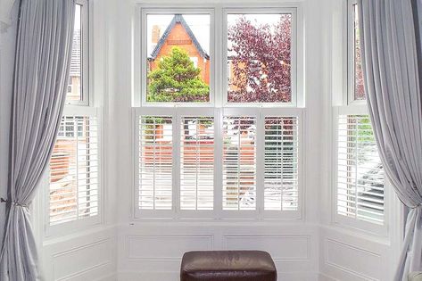 Roman blinds bay window