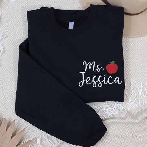 Amazon.com: Personalized Teacher sweatshirt, Embroidered Teacher Name Crewneck Sweatshirt, new teacher Gift for teacher, teacher appreciation gifts : Handmade Products Custom Embroidered Sweatshirt, New Teacher Gift, New Teacher Gifts, Teacher Sweatshirt, Teacher Clothes, New Teacher, Teacher Teacher, Teacher Name, Teacher Outfits