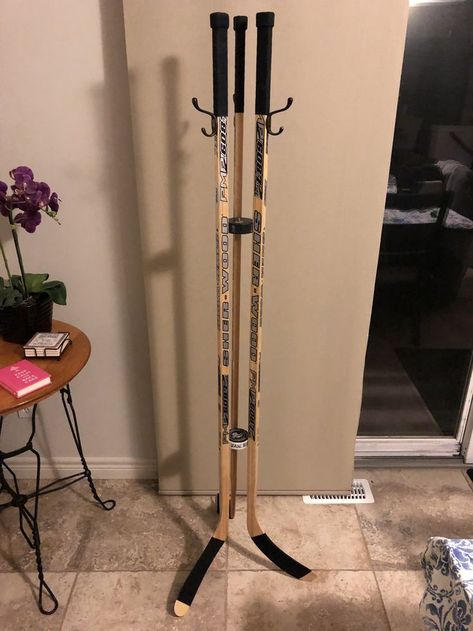 Hockey Stick coat rack Hockey Stick Coat Rack Diy, Hockey Stick Hat Rack, Hockey Stick Coat Rack, Hockey Stick Crafts Diy, Hockey Stick Decor, Hockey Stick Storage, Coat Rack Diy, Hockey Stick Furniture, Hockey Stick Crafts