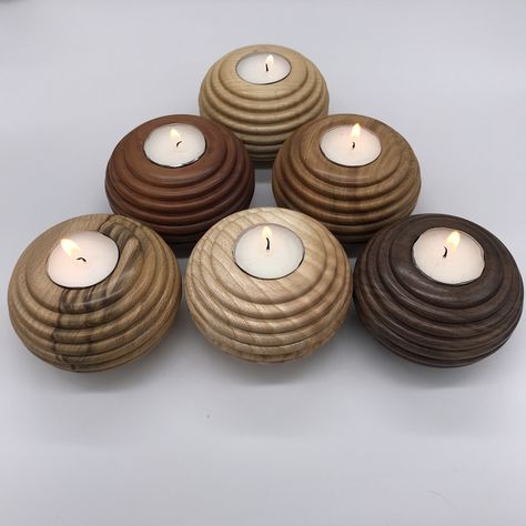 "A beautiful Ash wood turned tea light holder made in a \"bee hive\" design hand oiled and burnished to give a satin glow. It is from our own sourced milled and dried ash wood which we obtain from local farmers and land owners. It measures approximately 100mm diameter by 60mm high. One white tea light candle is included. We can make tea lights to your design in a variety of woods and can do most commissions." Wood Turning Christmas Ornaments, Wood Lathe Projects For Beginners, Wood Turning Ideas, Mini Lathe Projects, Wood Lathe Projects, Woodturning Ideas, Wooden T Light Holders, Wooden Tealight Holder, Tealight Candle Holders Wood