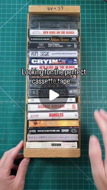 Lacy Stoneburner | Bookbinder on Instagram: "What do you think? Would you write in a cassette tape book?   When I found this tray of cassettes in my basement, I knew I needed to turn a few of them into a book. The binding works with the holes that are already in the tapes, so if I ever wanted to listen to these tapes again, I could easily cut the thread and they would be ready to play. 😁  #bookbinding #upcycling #cassettes #vintage #90smusic" How To Make A Mixtape Cassette, Cassette Tape Storage Ideas, Magazine Repurpose, Cassette Tape Crafts, Cassette Tape Art, Cassette Tape Storage, Tape Storage, Cassette Audio, Paula Abdul