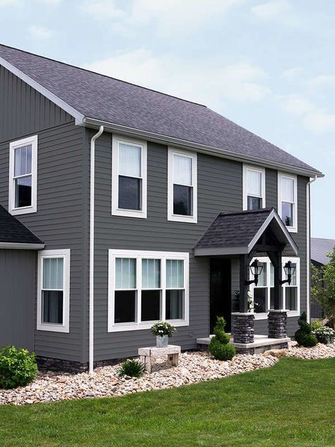 Slate gray exterior vinyl siding idea | These Classic Vinyl Siding Colors Deliver Curb Appeal for Years Grey Vinyl Siding, Vinyl Siding House, Siding Colors For Houses, Vinyl Exterior Siding, Vinyl Siding Colors, Exterior House Siding, Grey Siding, Gray House Exterior, Siding Options