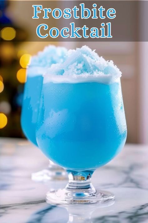 Frostbite Cocktail is a strikingly blue drink that combines the robust flavors of silver tequila with the sweetness of crème de cacao and blue curaçao. It’s balanced with a touch of heavy cream, creating a creamy texture that smooths out the flavors. Tequilla Sunrise, Blue Drink, Blue Drinks, Silver Tequila, Tequila Drinks, Sharing Is Caring, Blue Curacao, Tequila Cocktails, Punch Recipes