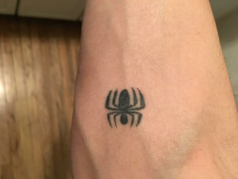 My brother, C, has this tiny Spiderman logo. I got a bigger version, myself. Tiny Spiderman Tattoo, Spiderman Tattoo Ideas Small Simple, Spiderman Henna, Small Spiderman Tattoo, Tiny Spiderman, Spiderman Logo Tattoo, Spiderman Tattoo For Guys, Minimalist Spiderman Tattoo, Spiderman Tattoos