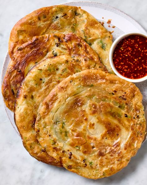 Scallion Pancakes Recipe (Easy & Extra Flaky!) | The Kitchn Pancakes Recipe Easy, Chili Dipping Sauce, Scallion Pancakes Chinese, Scallion Pancake Recipe, Indian Pancakes, Scallion Pancakes, Pancake Recipe Easy, Pancake Recipes, Meat Free