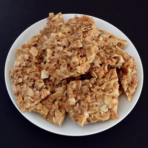 Toasted Coconut Brittle – Feral Cooks Coconut Peanut Brittle Recipe, Coconut Brittle, Fondant Potatoes, Peanut Brittle Recipe, Brittle Recipes, Fried Chicken Wings, Peanut Brittle, Cheese Appetizers, Golden Syrup