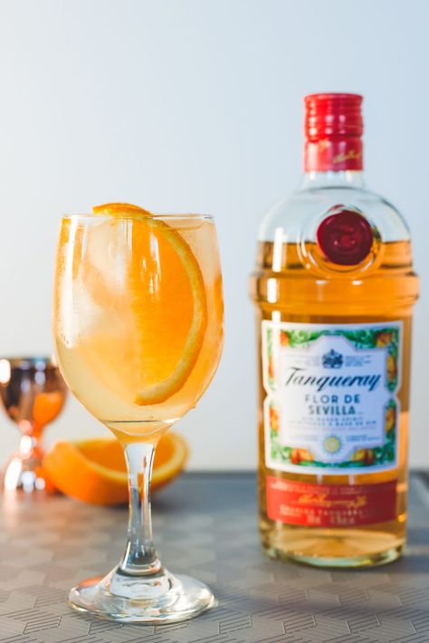 Sevilla Spritz cocktail - Tanqueray Flor de Sevilla gin | The GATE Tanqueray Sevilla Gin Cocktails, Spritz Cocktail, Ruby Red Slippers, Red Slippers, London Dry Gin, Cocktail Drinks Recipes, Dry Gin, 200 Calories, Gin Cocktails