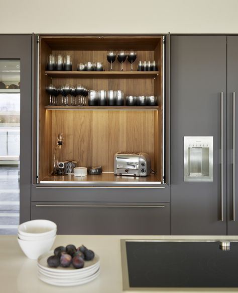 Walnut veneer interior of the #bulthaup pocket door with soft touch 'Lava' fronts. #kitchens #design #luxury #home #property #appliances #storage Bulthaup Kitchen, Organiser Cucina, Fixer Upper Kitchen, Appliance Cabinet, Hidden Kitchen, Best Kitchen Designs, Kitchen Design Plans, Luxury Kitchens, Trendy Kitchen