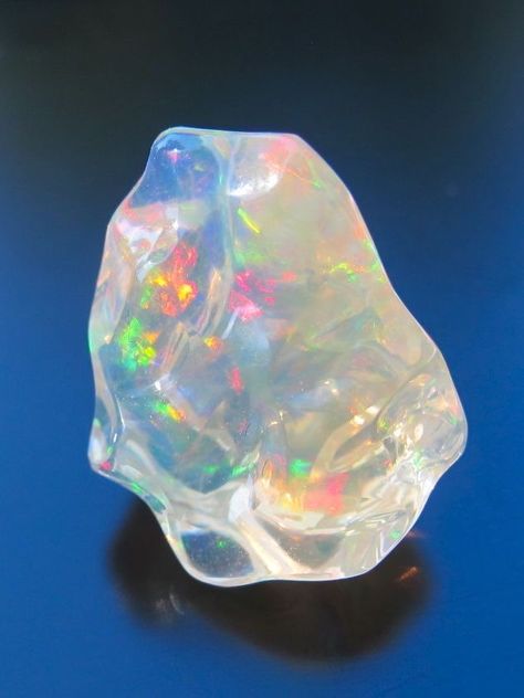 Mexican Fire Opal Geology Rocks, Mexican Fire Opal, Pretty Rocks, Beautiful Rocks, Mineral Stone, Minerals And Gemstones, Rocks And Gems, Gems And Minerals, Crystal Gems