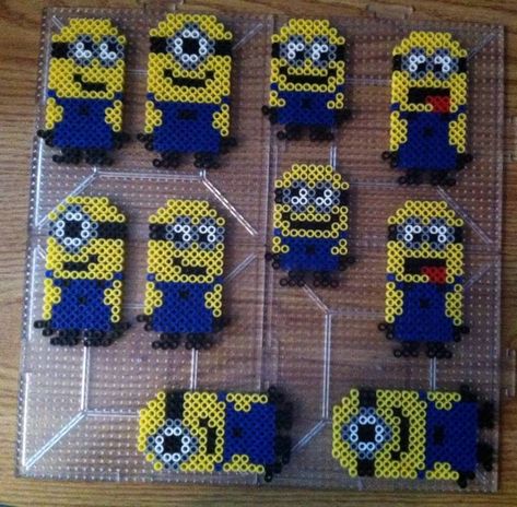 Minions Perler beads by Khoriana on DeviantArt Minion Fuse Beads, Hamahelmi Ideas, Pixel Pokemon, Hamma Beads Ideas, Easy Perler Bead Patterns, Melty Bead Patterns, Pearl Beads Pattern, Easy Perler Beads Ideas, Fuse Bead Patterns