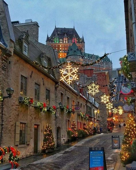 Christmastime in Quartier du Petit Champlain with Fairmont Le Château Frontenac towering above in Québec City, Canada Photo by: unknown Quebec City Christmas, Quebec City Winter, Nostalgic Winter, Chateau Frontenac, Quebec City Canada, Old Quebec, Christmas Town, Quebec City, Christmas Scenes