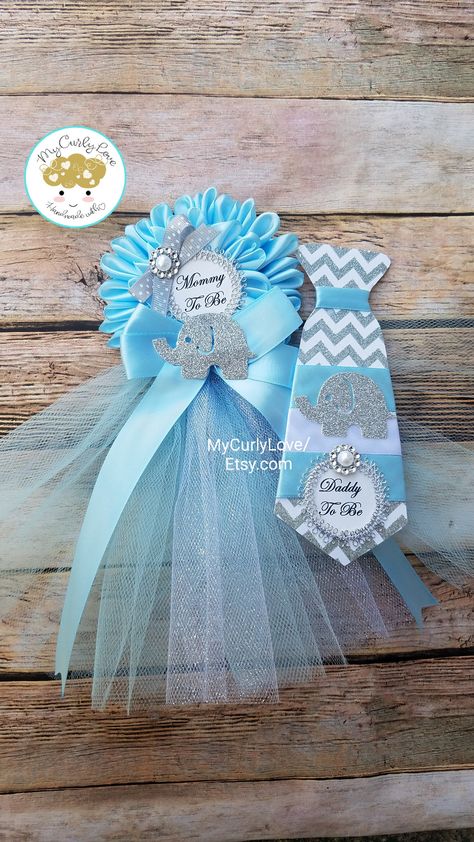 "**This listing includes Mommy Tulle and Daddy set**visit my shop for coordinating pins that are sold separately. *(tutu) Mommy to be Corsage 4 1/2\" wide approx top round part 8\" long 1.5\" back pin included ready to use *Tie 6 1/2\" long 2 1/2\" wide 1.5\" back pin included ready to use Available in more colors All sales are final. No refunds, No exchanges. Shipping: Please allow 2 weeks before shipping. If you have any questions please contact me. Thank you for visiting MyCurlyLove!" Baby Bottle Favors, Mommy To Be Corsage, Babby Shower, Mommy To Be Pins, Fall Baby Shower Themes, Elephant Baby Shower Cake, Elephant Baby Shower Favors, Peanut Baby Shower, Baby Shower Boho