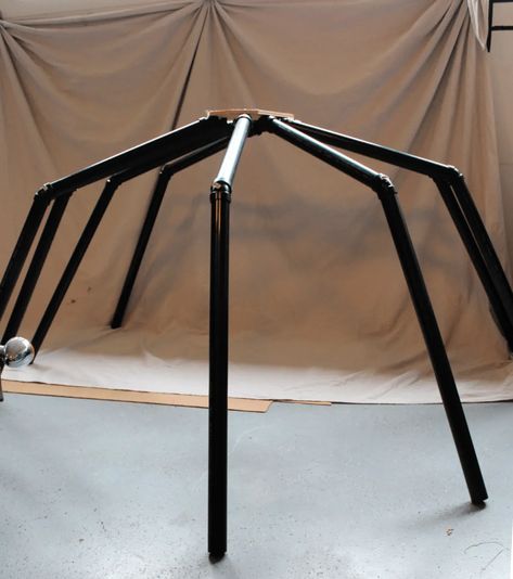 DIY Giant Halloween Spider - Design by D9 Diy Oversized Halloween Decorations, Giant Outdoor Spider Diy, Pvc Spider Halloween, Large Spider Diy, Spider Web Tunnel Diy, Large Spider Decoration Diy, Diy Large Spider Web, Halloween Spiders Diy, Giant Skeleton Ideas