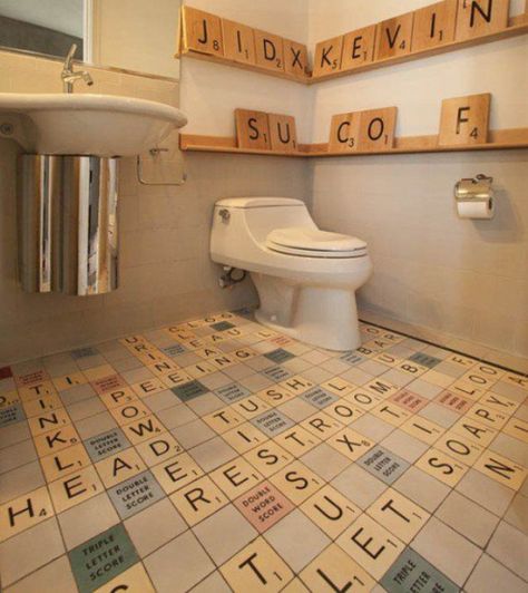 Top 10 Creative and Unusual Bathroom Floors Unusual Bathrooms, Quirky Bathroom, Board Game Cafe, Game Cafe, Bathroom Stand, Scrabble Wall, Unique Flooring, Unique Bathroom, Scrabble Tiles