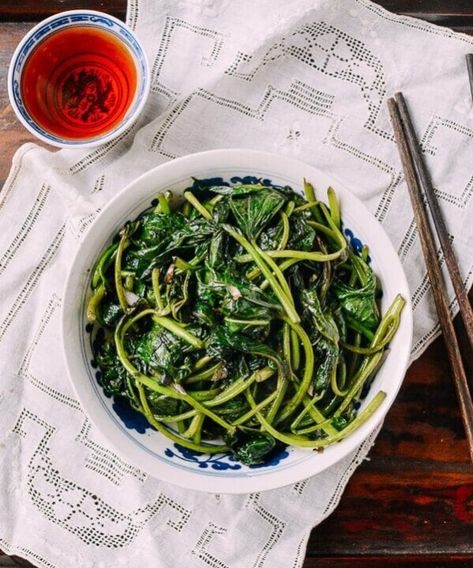 Stir-Fried Snow Pea Leaves with Garlic | The Woks of Life Yam Leaves, Sweet Potato Stir Fry, Chinese Vegetarian, Sweet Potato Leaves, Yam Or Sweet Potato, Wok Of Life, Healthy Stir Fry, Woks Of Life, The Woks Of Life