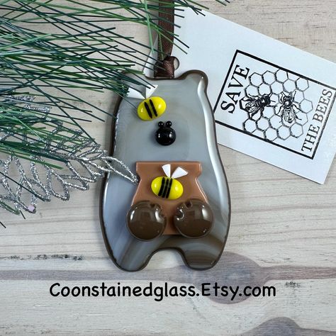 Brown Bear Ornament with a Honey Pot and Bees, Fused Glass Bear Decor, Bear Cabin Decor, Woodland Animal, Honey Bees, Glass Ornament by CoonStainedGlass on Etsy Bear Cabin Decor, The Honey Pot, Bear Ornaments, Bear Cabin, Brown Ribbon, Black Bee, Black Nose, Bear Decor, White Wings