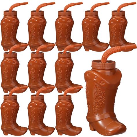 PRICES MAY VARY. Package Content: you will receive 12 cowboy boot cups with straws, sufficient quantity to meet your use and decoration; This is a nice combination set for your cowboy theme party and more Practical Design: each cowboy boot cups is equipped with a straw that is long enough to reach the bottom of the cup, so that children can easily finish the water or beverages in the cup without wasting or spilling Reliable and Quality: cowboy boot cups are made of safe plastic material, lightweight but sturdy, easy to clean and hard to break, which can be repeatedly applied; Please note that it is not recommended to using dishwasher Size Information: this cowboy boot cups has a capacity of 10 ounces, and is approximately 5.8 inches tall, can be placed on the table or easily handheld Wide Rodeo Party Decorations, Boot Centerpiece, Western Themed Party, Plastic Cup With Straw, Cups With Straws, Rodeo Gifts, Cowboy Theme Party, Wild West Party, Rodeo Party