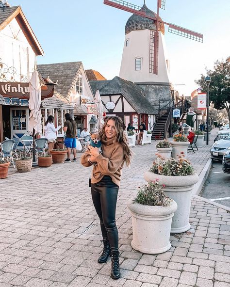 Solvang, California Windmill Fall fashion | fall outfit inspiration | fall ootd | fall outfit inspo | California road trip | Santa Ynez valley | pose with dog | chihuahua | windmill photo op | San Luis Obispo | Los Angeles | turtleneck | leather leggings Solvang California Outfit Winter, Solvang California Outfit, Pose With Dog, Windmill Photos, Solvang California, California Road Trip, Santa Ynez Valley, Fall Outfit Inspiration, Dog Chihuahua