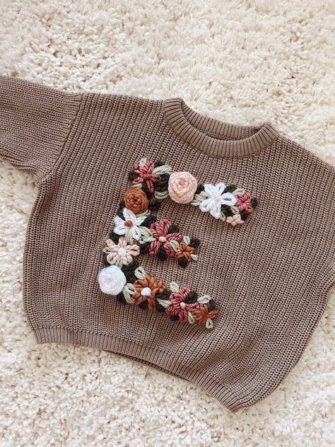 Custom initial flower design embroidered baby and toddler knit sweater Baby Embroidered Sweater, Embroidered Kids Clothes, Knitted Baby Sweaters, Toddler Knit Sweater, Etsy Baby Clothes, Embroidered Name Sweater, Embroidered Baby Sweater, Baby Name Sweater, Embroidered Baby Clothes