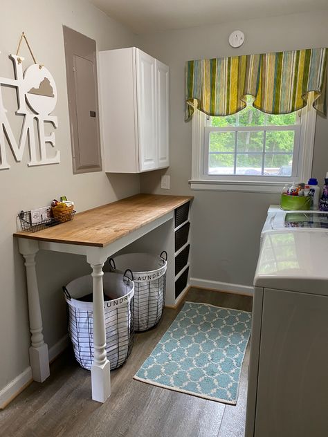 Table In Laundry Room Small Spaces, Laundry Folding Station Small Space, Top Loader Laundry Room Small Spaces Folding Tables, Fold Up Folding Table Laundry Room, Laundry Room Table Folding, Folding Station Laundry Room Diy, Add Sink To Laundry Room, Small Laundry Room With Folding Table, Laundry Room Folding Table With Hampers