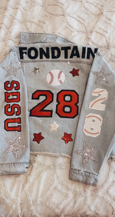 Custom Sports Jean Jackets, Baseball Custom Shirts, Baseball Game Outfit High School, Football Girlfriend Denim Jacket, Sports Team Jean Jacket Diy, High School Baseball Game Outfit, Football Game Outfit Girlfriend, Boyfriend Football Jean Jacket, Football Girlfriend Jean Jacket Ideas